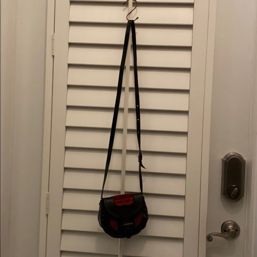 Peruvian mini leather bag never used